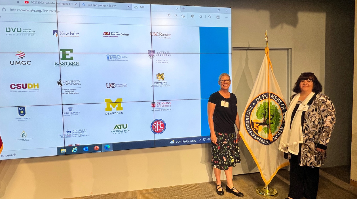 Representatives from UVU's School of Education signing the Digital Equity and Transformation Pledge, a commitment to promoting digital equality and innovative education practices.