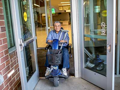 Person riding scooter