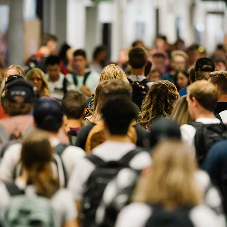 Students fill the hallway on the first day of classes.