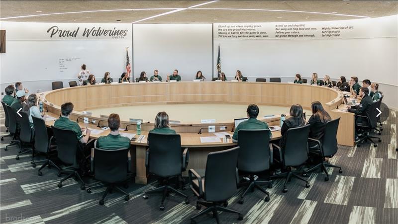 students sitting in a council meeting